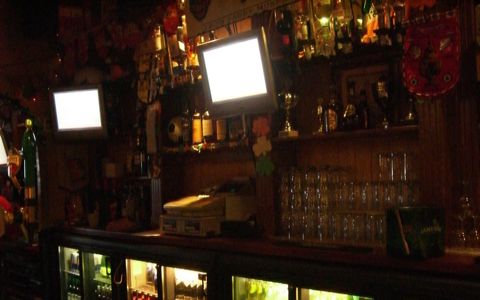 Television screens behind the bar